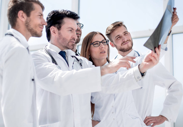 group of doctors discussing the x-ray - Photo, Image