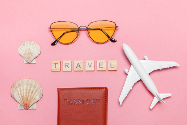Minimal simple flat lay travel adventure trip concept on pink pastel trendy modern background - Fotografie, Obrázek