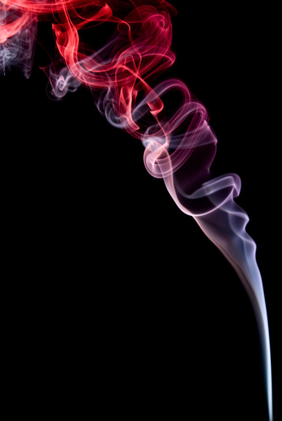 Coloured smoke isolated on black background - Foto, Bild