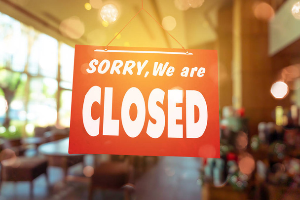Sorry we are closed sign hang on door of business shop. - Photo, Image