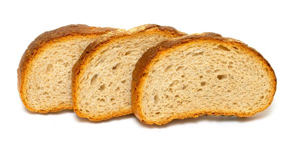 Φέτες ψωμί σε απομονωμένα σε λευκό φόντο. Φωτογραφικό στούντιο. - Φωτογραφία, εικόνα