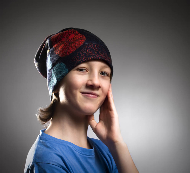 Portrait of a Boy in Hat Smiling - 写真・画像