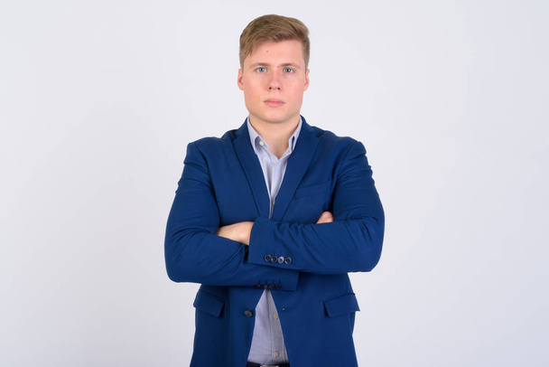 Portrait of young handsome blonde businessman with arms crossed - Фото, изображение