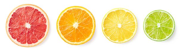 柑橘系の果物のスライスの白い背景で隔離 - 写真・画像