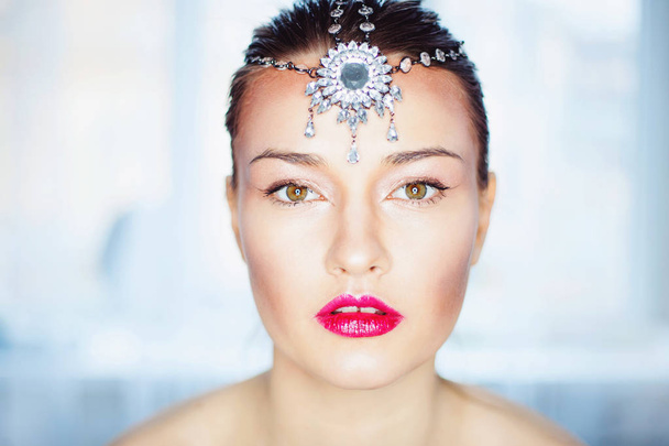 Beauty high fashion model girl with perfect beautiful make up posing in studio light background - Valokuva, kuva