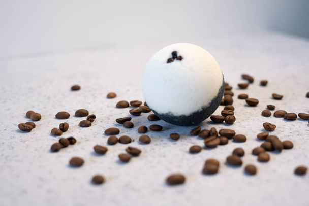 Bath bombs with coffee grains on a white background - Φωτογραφία, εικόνα