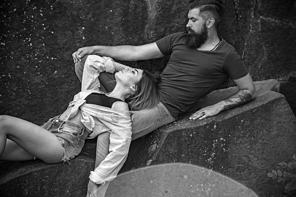 The best romantic vacation for couple. Sensual couple on vacation trip. Sexy woman and bearded man on natural landscape. Couple in love on summer vacation. They love travelling - Foto, imagen