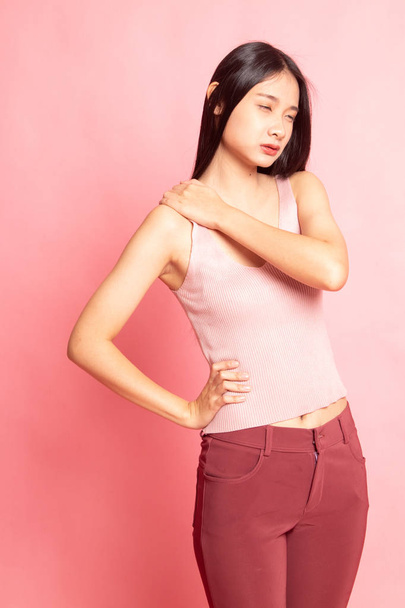 Young Asian woman got back pain. - Фото, изображение
