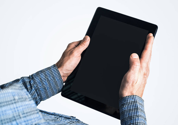 Close up of businessperson using digital tablet with blank display - Photo, image