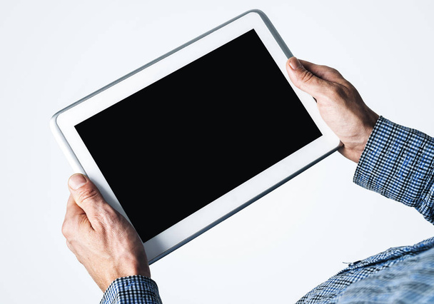 Close up of businessperson using digital tablet with blank display - Foto, Imagem