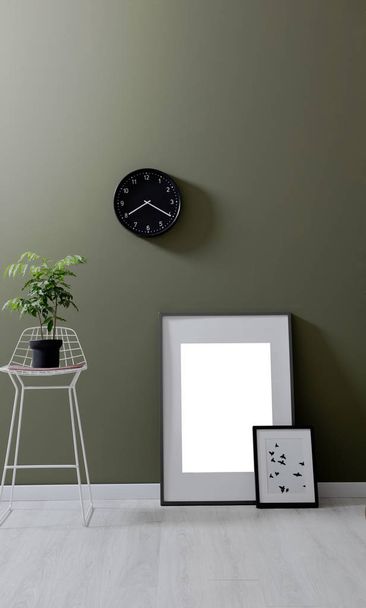 Green wall, chair, frame pillow clock still life. - Fotó, kép