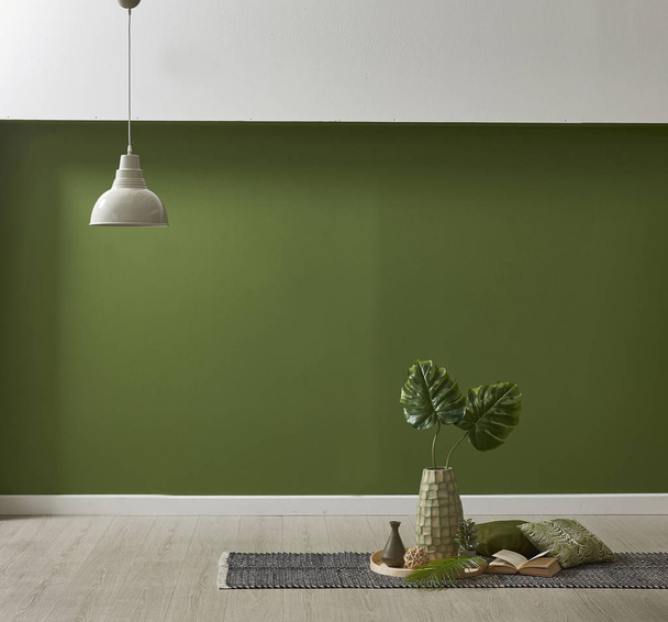 papier peint vert moderne et maquiller la décoration intérieure avec des plantes et des oreillers
 - Photo, image