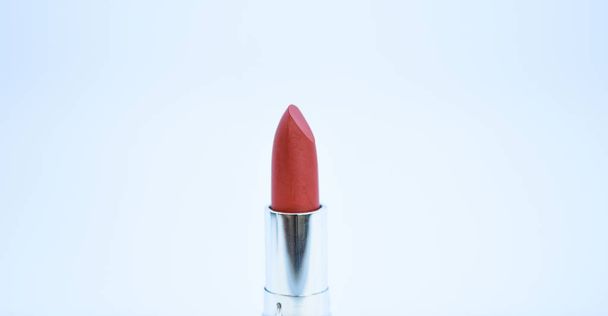 Beauty trend. Daily make up. Lipstick for professional make up. Adding some shine to lips. Lip care concept. Lipstick on white background. Water resistant high quality lipstick product. Must have - Фото, зображення
