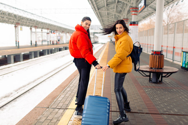 Young females take  the train. - Valokuva, kuva