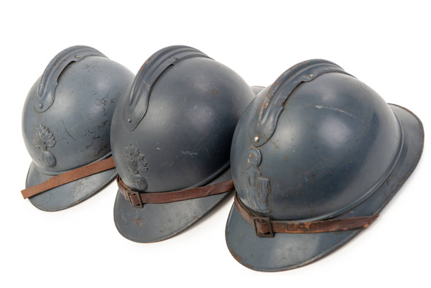 three french military helmets of the First World War on white ba - Photo, Image