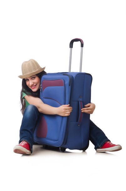 Young woman with suitcase isolated on white - Photo, Image