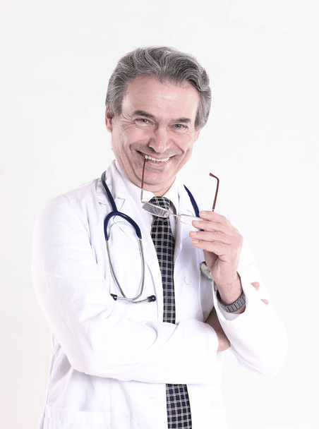 portrait of a benevolent physician therapist.isolated on white background - Zdjęcie, obraz