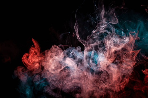 Fog colored with bright red and blue  gel on dark backgroun - Φωτογραφία, εικόνα