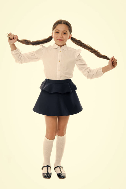 Did on my own. Coolest back to school hairstyles. Gorgeous tails perfect for every day of week. Schoolgirl happy smiling pupil long curly hair. Hairstyle for schoolgirl nice and easy - Fotó, kép