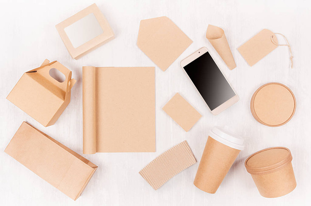 Food takeaway set mockup for brand - different container and box of kraft paper for asian cuisine, blank screen phone, bag, notepad, cup on white wood board. - Φωτογραφία, εικόνα
