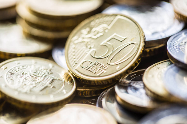 Close-up a pile of new euro coins in other compositions - 写真・画像