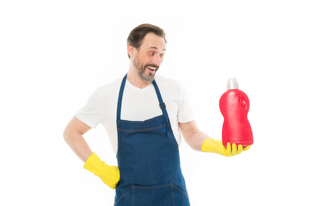 My favorite product for cleaning. Cleaning service and household duty. Man in rubber gloves hold plastic bottle liquid soap chemical cleaning agent. Bearded guy cleaning home. Cleanup concept - Φωτογραφία, εικόνα