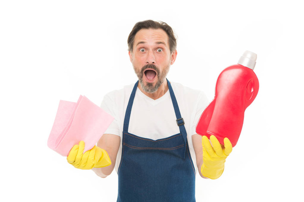Cleaning tricks and tips. Cleaning service and household duty. Man in rubber gloves hold bottle liquid soap chemical cleaning agent. Bearded guy cleaning home. Cleanup concept. Get rid of stains - Φωτογραφία, εικόνα