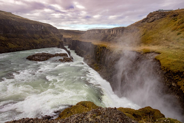View of a waterfall in Iceland. Water flows from top to bottom. - Photo, Image