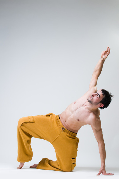 Young handsome dancer exercising - Фото, изображение