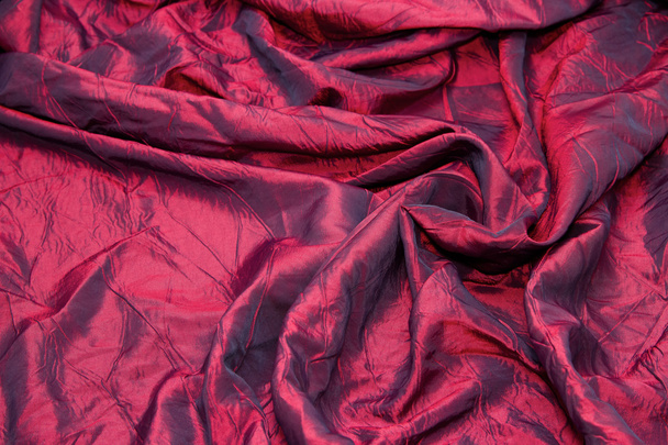 赤い絹の織り目加工布のクローズ アップ - 写真・画像