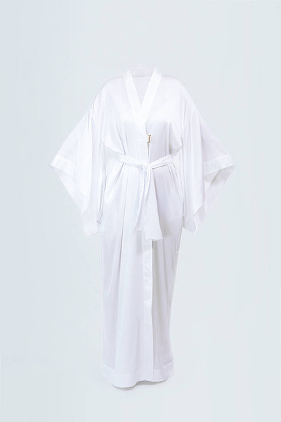 Silk female long white robe isolated on grey - Zdjęcie, obraz
