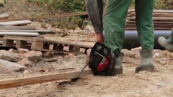 Man Starts A Chainsaw - Footage, Video