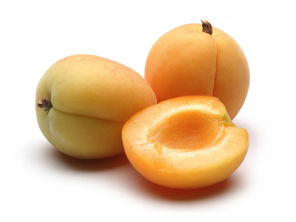 Fresh apricot fruits isolated on white - Foto, imagen