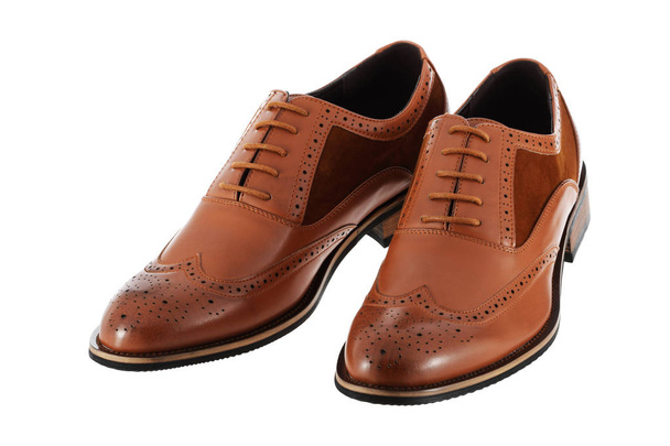 Pair of brown leather men's shoes brogues on a white background  - Photo, Image