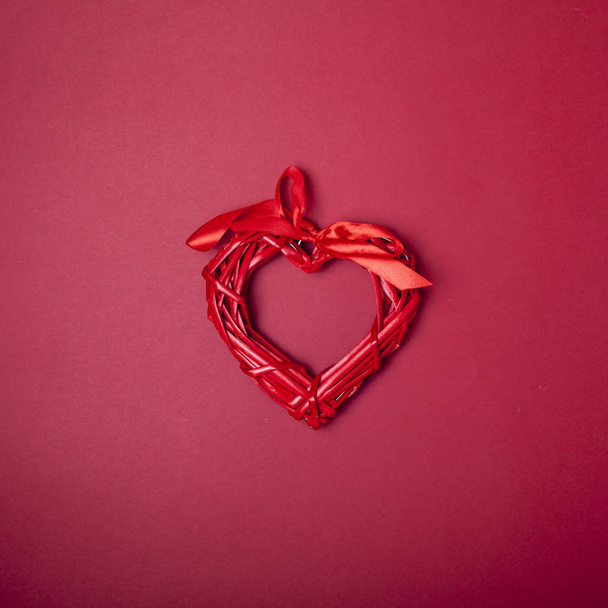 Gift card. Love heart shape. Red, pink, violet. Red background. Valentine day, woman day congratulations concept. Free space for text. Copy space. - 写真・画像
