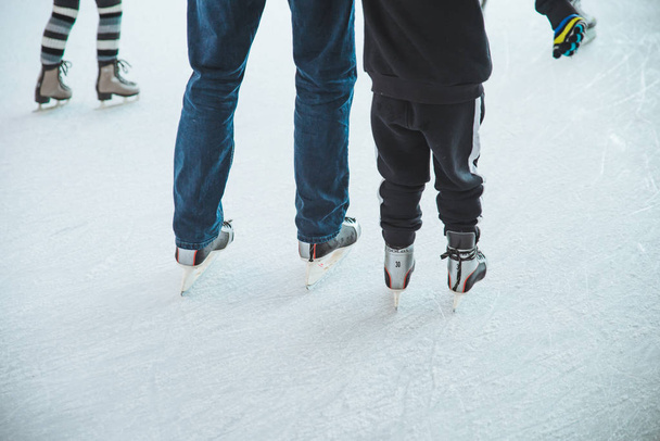 LVIV, UKRAINE - February 3, 2019: people skating on ski rink in city mall - Fotografie, Obrázek
