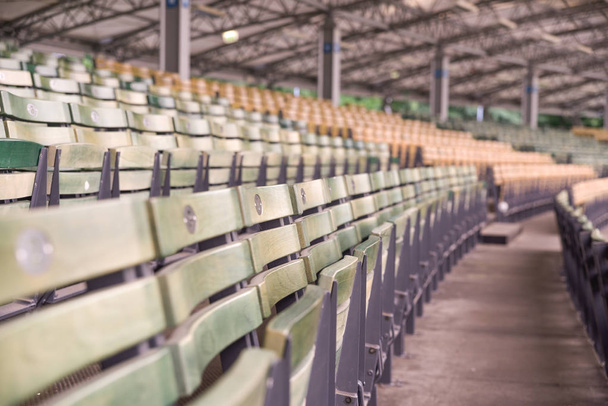 Rows of wooden empty seats  - Photo, image