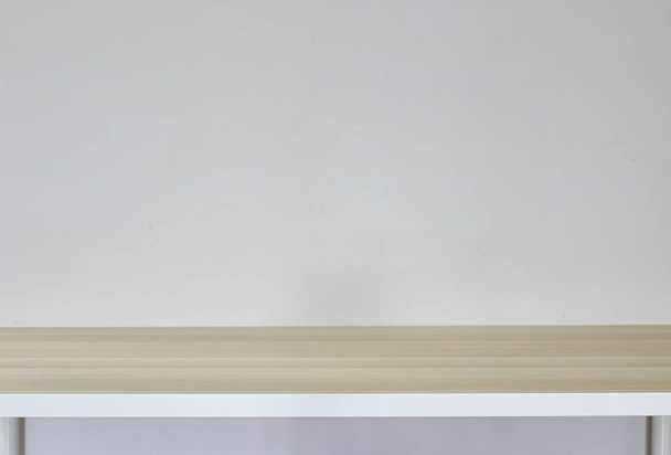 Empty light brown table in white room - Фото, зображення