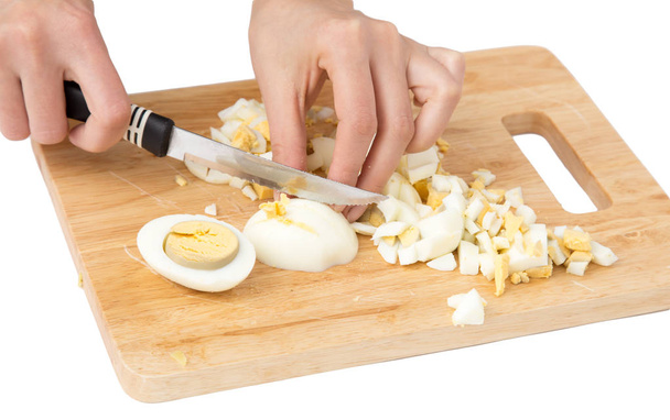 cook eggs on cutting board on a white background - Φωτογραφία, εικόνα