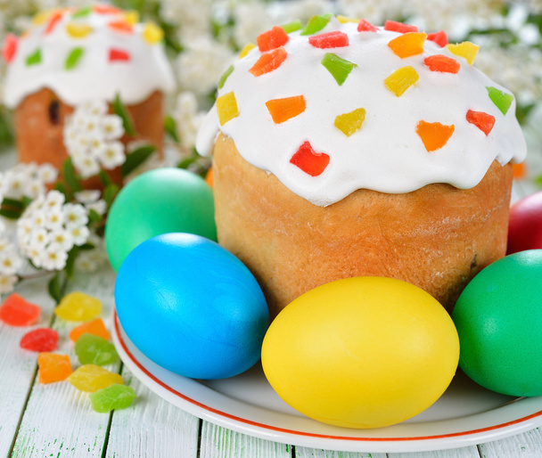 Easter cake and eggs on a white table - 写真・画像