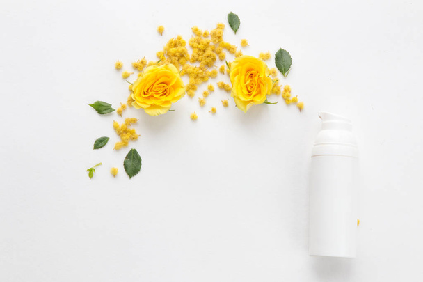 moisturizer for face and flowers. creative composition in the style of minimalism - Photo, image