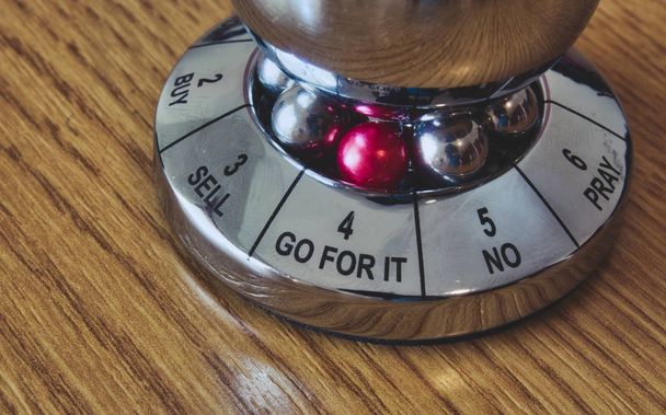 Metal decision maker with 'Go for it' selected from the wheel of options - Fotó, kép