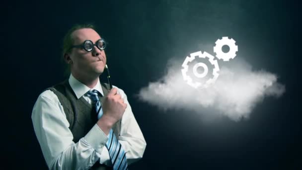 Zabawny nerd lub geek chce flying cloud z obrotową ikona koła zębate - Materiał filmowy, wideo