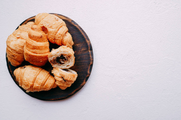 chocolate filled croissants. culinary background - Фото, изображение