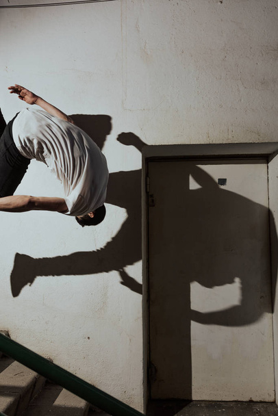 young sportsman practicing parkour. - Photo, Image