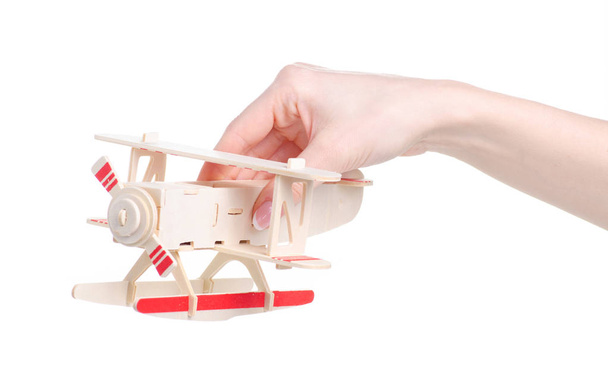 wooden constructor model airplane in hand - Photo, Image