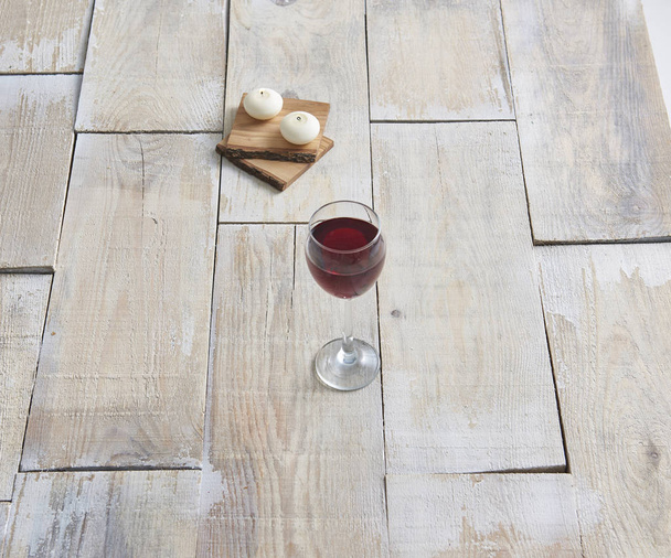 empty wooden floor and  red wine - Photo, image