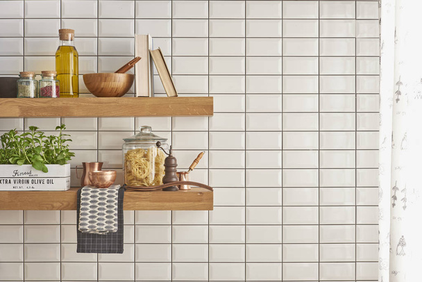 white marble countertops, brass hardware modern kitchen  - Photo, Image