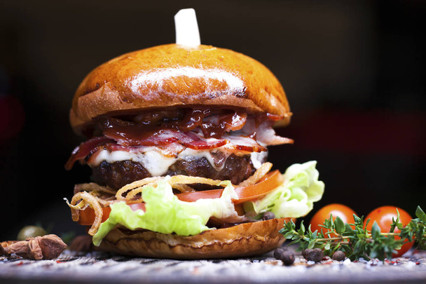 Fast food with traditional tasty hamburger - Фото, зображення