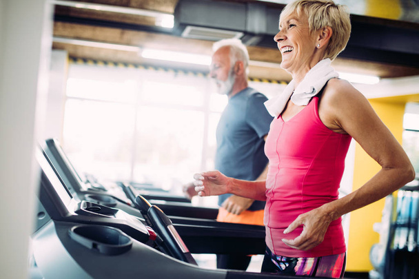 Image of attractive fit mature woman in gym - Fotoğraf, Görsel